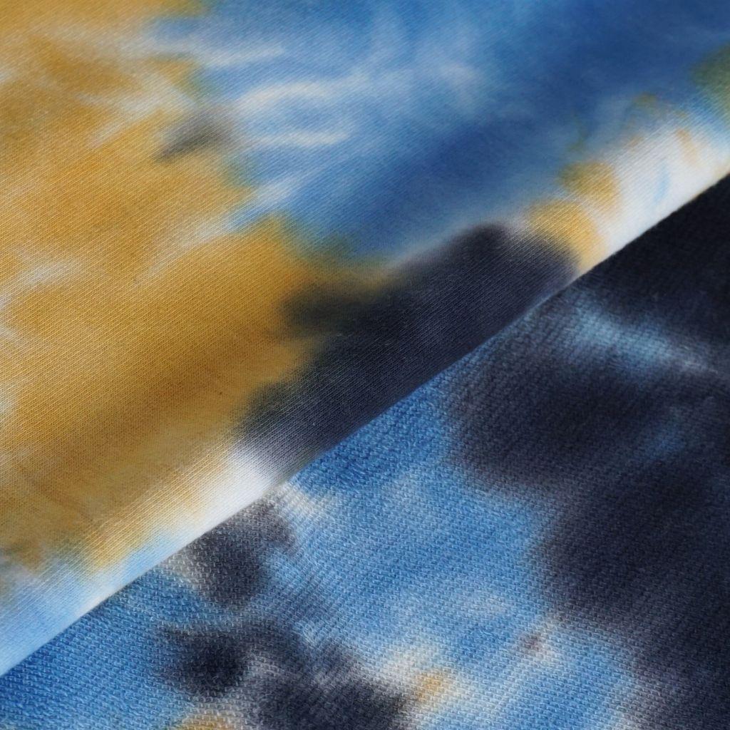 French Terry Batik blau schwarz gelb